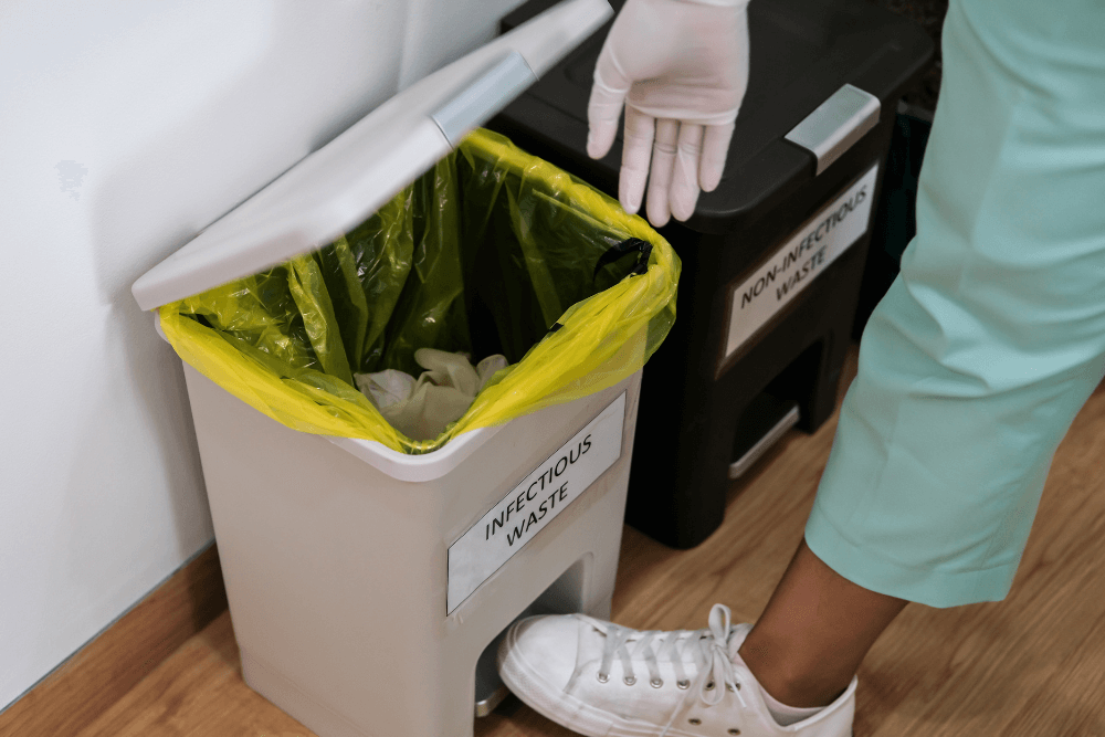 What are the Health Risks of Improper Disposal of Infectious PPE Waste?